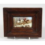 A SMALL FRAMED PORCELAIN PLAQUE "HUNTING SCENE". 1.5ins x 2.5ins.