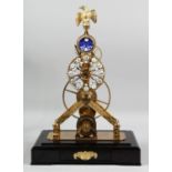 A GOOD MOON FACE BRASS SKELETON CLOCK in a glass dome. 1ft 8ins high.