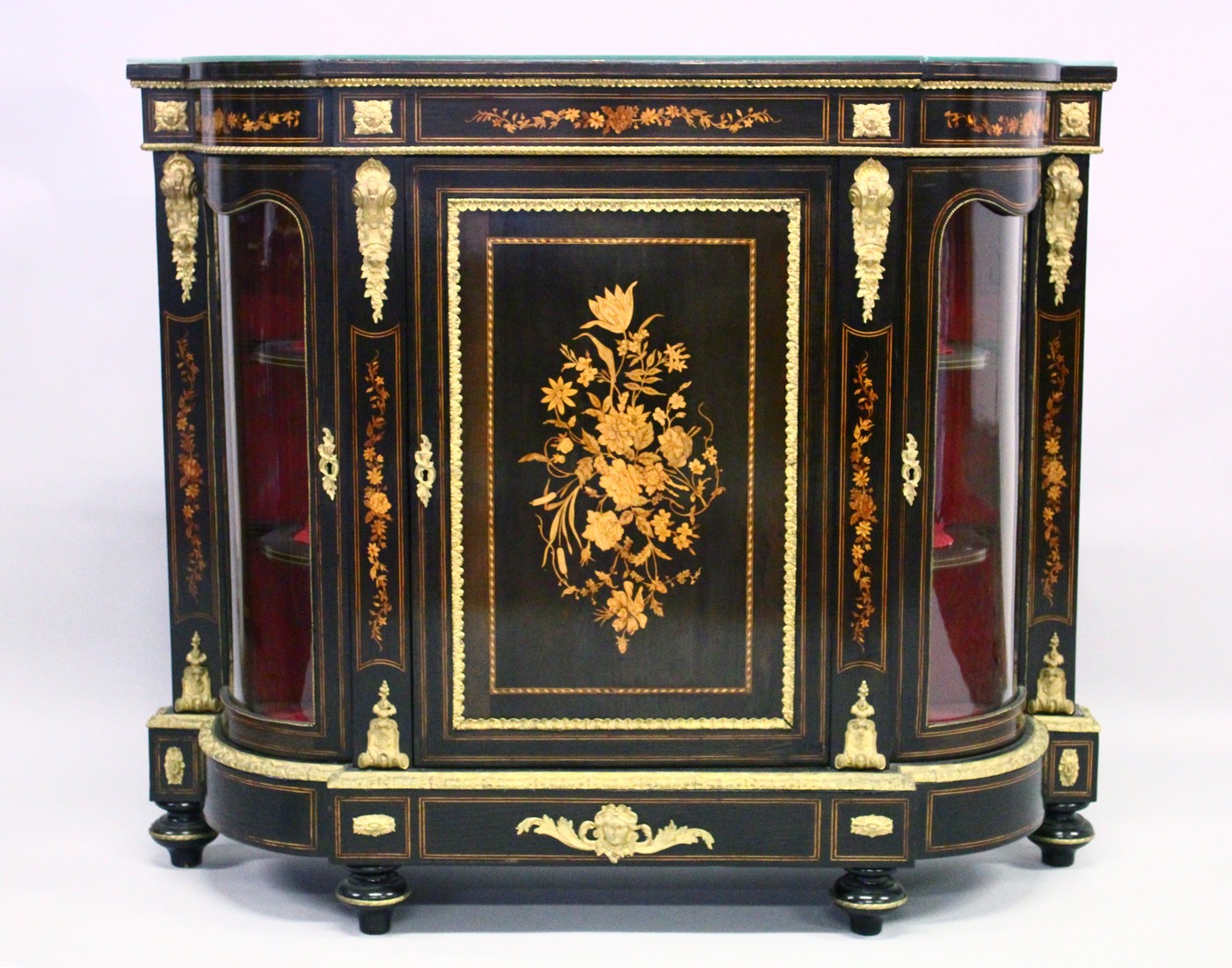 A GOOD 19TH CENTURY FRENCH EBONY AND MAHOGANY CREDENZA marquetry panel to the front glass bowed