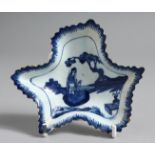 A BOW LEAF SHAPED PICKLE DISH painted with the rare Koto player in underglaze blue
