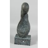 AN ABSTRACT BRONZE FIGURE. 17ins high.