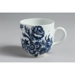 A RARE BOW PRINTED COFFEE CUP with a rose, insects and other flowers.