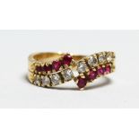 AN 18CT GOLD, RUBY AND DIAMOND RING.