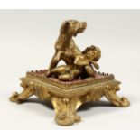 A GOOD 19TH CENTURY BRONZE GROUP, A DOG AND A SMALL CHILD on a square base. 6ins wide.