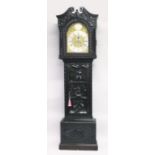 A 19TH CENTURY CARVED OAK LONG CASE CLOCK with eight day movement, arch brass dial with subsidiary