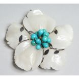 A LARGE QUARTZ FLOWER AND TURQUOISE PENDANT.