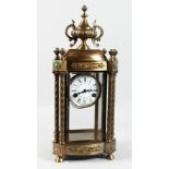 A GOOD GILT BRONZE FOUR GLASS CLOCK with urn finial. 22ins high.