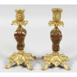 A GOOD PAIR OF 19TH CENTURY FRENCH BRONZE AND METAL CANDLESTICKS.