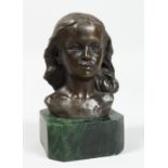 A BRONZE BUST OF A YOUNG GIRL. Signed, 4ins on a marble plinth