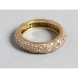 A YELLOW GOLD PAVE SET DIAMOND ETERNITY RING