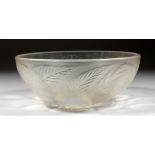 A LALIQUE CIRCULAR BOWL with flowers in iridescent blue. 9ins diameter. Mark R. LALIQUE, FRANCE.
