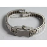 A 14CT WHITE LAFEMME ART DECO DIAMOND SET COCKTAIL WATCH.