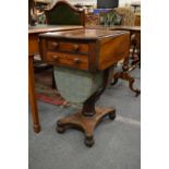 A 19th century rosewood drop-flap two drawer pedestal worktable.