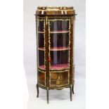 A GOOD LOUIS XVI STYLE KINGWOOD VITRINE (19TH CENTURY) with ormolu mounts, the top with bowed
