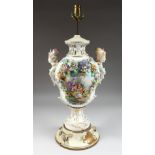 A GOOD MEISSEN STYLE PORCELAIN LAMP encrusted with flowers, painted panels and finial head