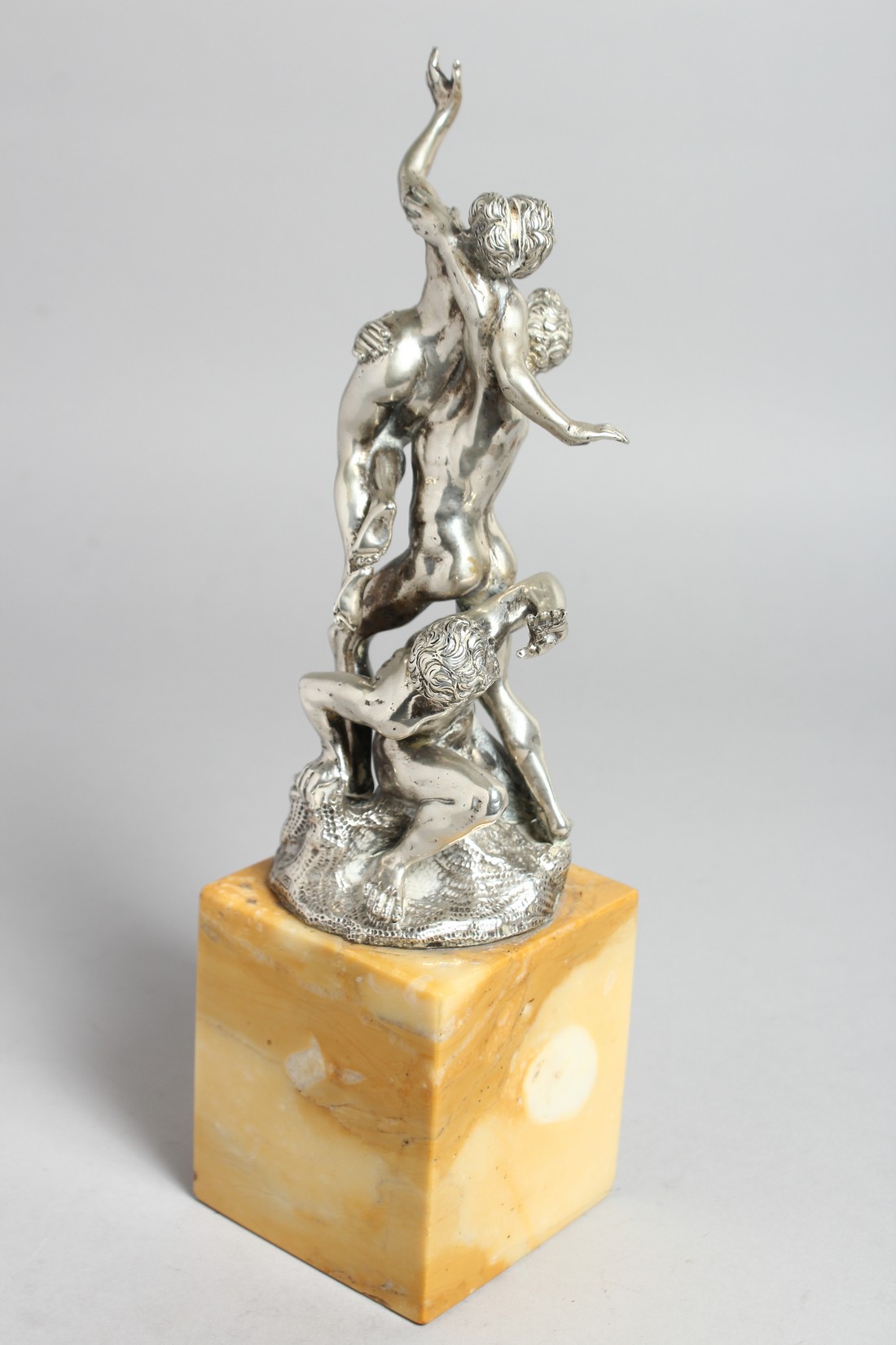 A SUPERB SILVER GROUP OF A CLASSICAL SCENE, TWO MEN AND A NUDE. 10ins high on a marble base. - Image 7 of 10