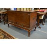 A good George III mahogany coffer on stand with rising top, two small drawers, the stand with