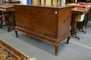 A good George III mahogany coffer on stand with rising top, two small drawers, the stand with