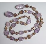 A GOOD AMETHYST AND BEAD STONE NECKLACE