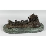 C. M. RUSSELL. A BRONZE STAGE COACH. Signed, 19ins long on a marble base.