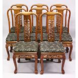 A GOOD SET OF EIGHT CHINESE HARDWOOD CHAIRS, 20TH CENTURY with carved back splats, solid seat with