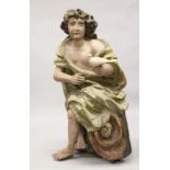 A VERY GOOD LARGE ITALIAN CARVED AND PAINTED FIGURE with a drape and holding a dove.