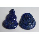 TWO CARVED LAPIS PENDANTS