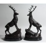 AFTER J. MOIGNIEZ. A PAIR OF STAGS on a rock. Signed, 16ins high.