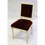 A LOUIS XVI STYLE PAINTED AND GILDED SINGLE CHAIR with padded back and seat on fluted legs.