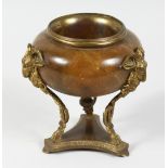 A REGENCY GILT BRONZE AND ALABASTER BOWL with ram's head support and triangular base. 6ins high.