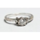 AN 18CT GOLD SOLITAIRE DIAMOND RING.