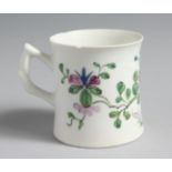 A RARE BOW EARLY COFFEE CAN of waisted form and flat base with moulded handle painted in famille