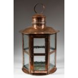 A GOOD EDWARDIAN SHEET COPPER GLASS HANGING CIRCULAR LANTERN.