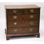 A GEORGE III MAHOGANY STRAIGHT FRONT CHEST with two short and three long graduated drawers on