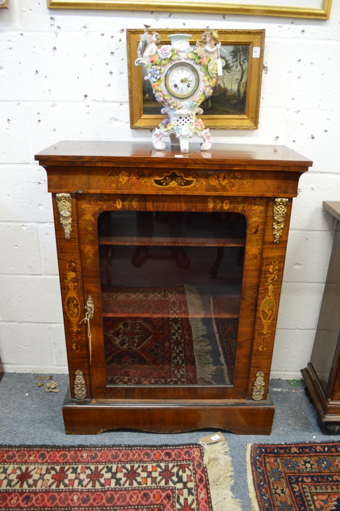 A good Victorian walnut and marquetry inlaid pier cabinet.