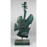 A LARGE ABSTRACT BRONZE VIOLIN. 3ft high on a rectangular base.