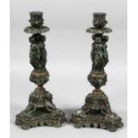 A PAIR OF 19TH CENTURY FRENCH BRONZE SPELTER CLASSICAL CANDLESTICKS with three classical female