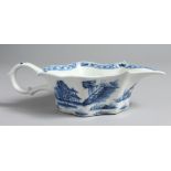 AN EARLY BOW SAUCE BOAT with flat underglaze painted in underglaze blue with two Chinoiserie