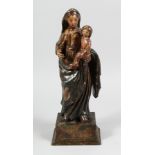 A GOOD POLYCHROME OAK MADONNA AND CHILD on a rectangular base. 16ins high.