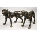A VERY GOOD LARGE PAIR OF BRONZE TIGERS. 46 inches nose to tail
