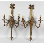 A PAIR OF 19TH CENTURY FRENCH GILT BRONZE WALL SCONCES, Adam design, with three scrolling