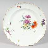 A GOOD MEISSEN CIRCULAR PLATE, sprigged and painted with flowers.