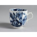 A BOW RARE FLUTED COFFEE CUP with ornate handle painted in underglaze blue with a version of the