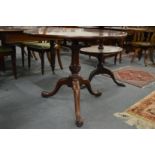 A good George III mahogany circular tilt top tripod table with bird-cage action.