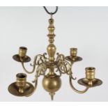 A SMALL 18TH - 19TH CENTURY, POSSIBLY DUTCH, FOUR BRANCH WALL LIGHT. 14ins diameter.