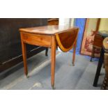 A George III mahogany and satinwood banded oval Pembroke table, with a draw to each end on