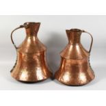 TWO LARGE COPPER ISLAMIC JUGS 16ins high.