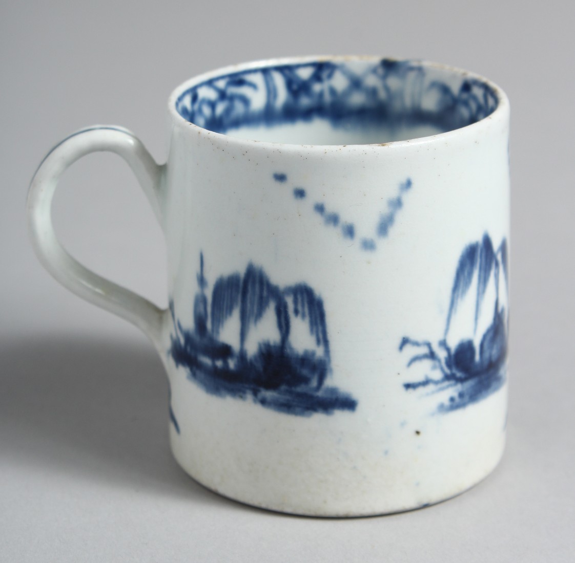 A BOW COFFEE CUP painted in underglaze blue with tall rocks and a bridge. - Image 3 of 6