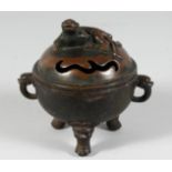 A CHINESE BRONZE CIRCULAR CENSER with dog of Foe, on three lion legs. 5ins diameter.