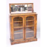 A GOOD VICTORIAN WALNUT PIER CABINET with mirrored top, glass panel doors and sides, enclosing three